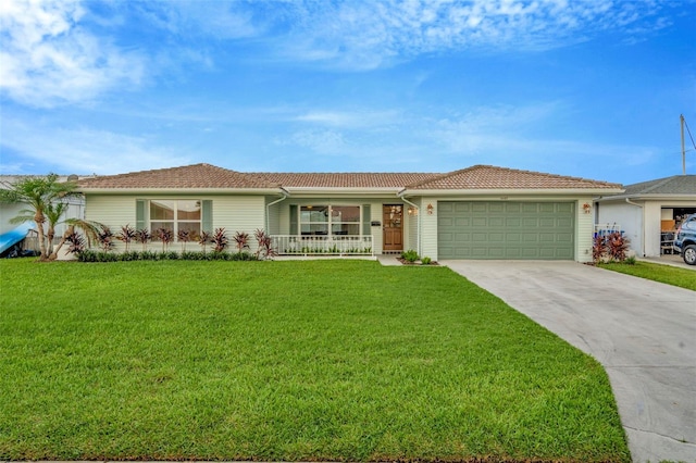 single story home featuring a garage, a front yard, and a porch