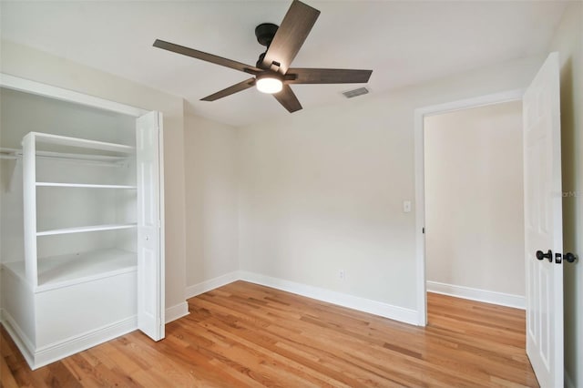 unfurnished bedroom featuring light wood-type flooring, visible vents, and baseboards