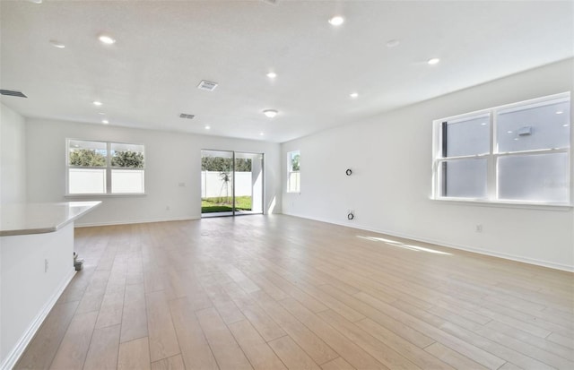 unfurnished room featuring light hardwood / wood-style flooring