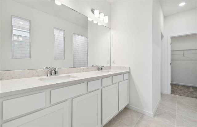 bathroom with vanity and tile patterned floors