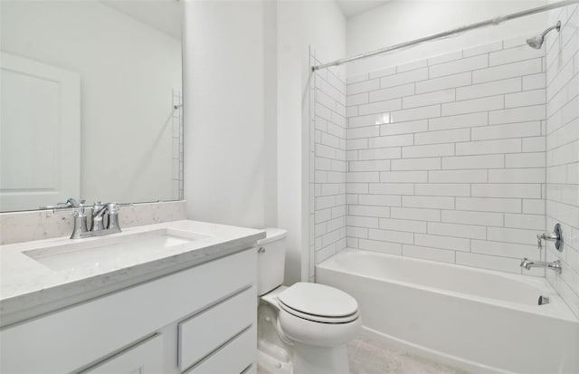 full bathroom with vanity, toilet, and tiled shower / bath combo