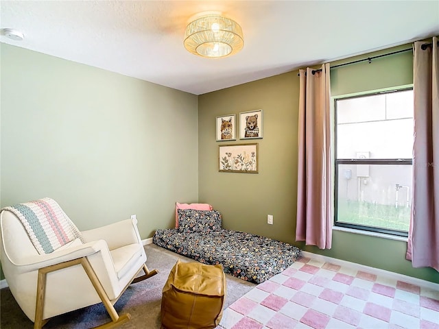 bedroom featuring baseboards