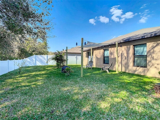 view of yard featuring a fenced backyard