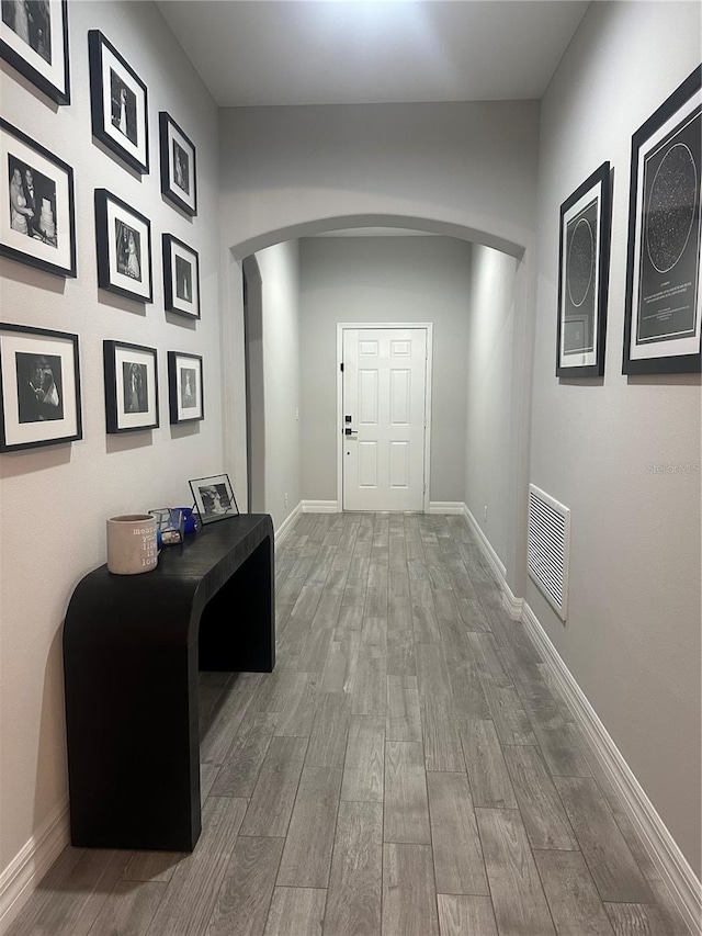 hall featuring hardwood / wood-style flooring