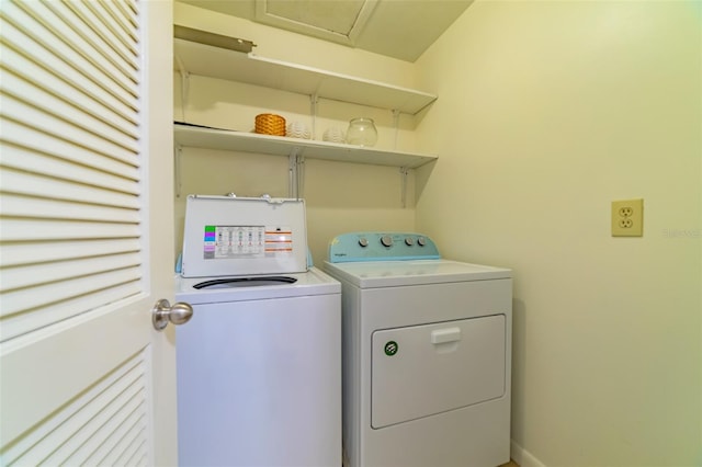 washroom with laundry area and washing machine and clothes dryer