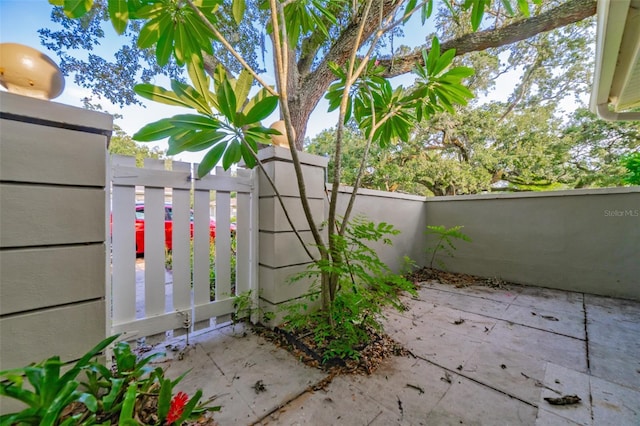 exterior space with a patio area and fence