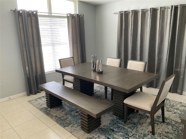 dining room with light tile patterned flooring