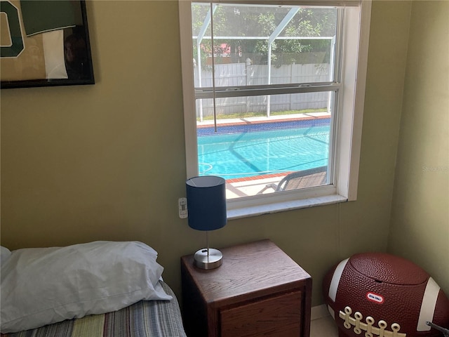 bedroom featuring multiple windows