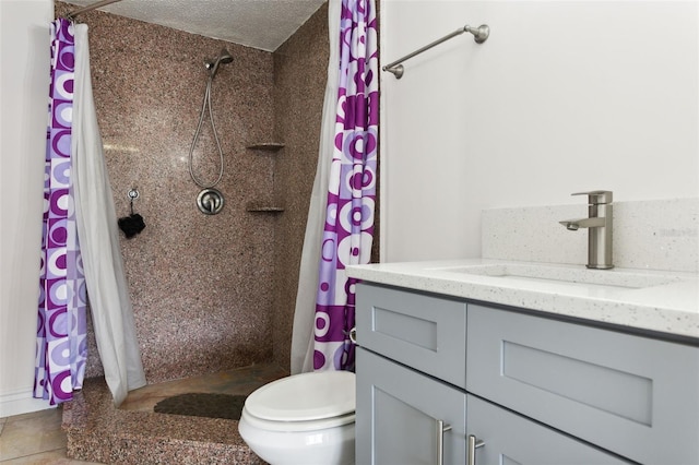 bathroom featuring tile patterned floors, a textured ceiling, a shower with shower curtain, vanity, and toilet