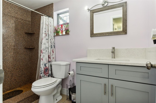 full bathroom with toilet, curtained shower, and vanity