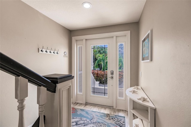 210 Lakeview Dr, Anna Maria, FL 34216 - foyer featuring wood finished floors