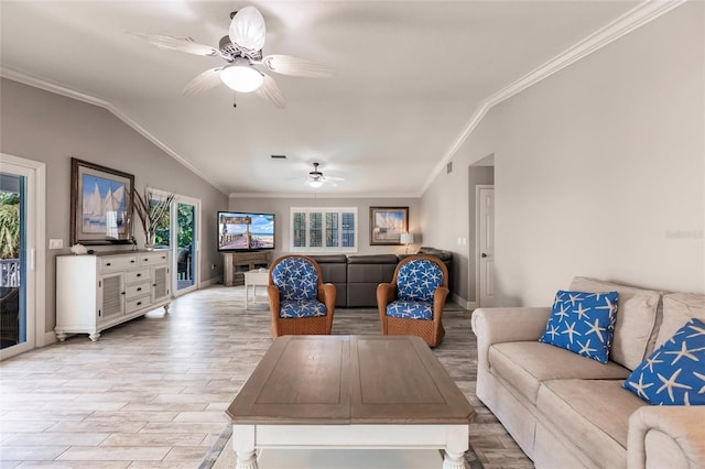 210 Lakeview Dr, Anna Maria, FL 34216 - living room featuring vaulted ceiling, light wood-style flooring, ceiling fan, and ornamental molding