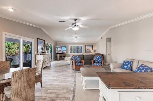 210 Lakeview Dr, Anna Maria, FL 34216 - living area with crown molding, lofted ceiling, light wood-type flooring, visible vents, and ceiling fan