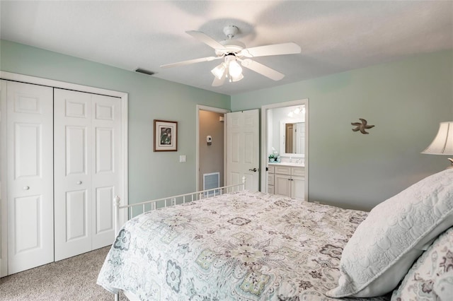 210 Lakeview Dr, Anna Maria, FL 34216 - carpeted bedroom with visible vents, a closet, a sink, and a ceiling fan