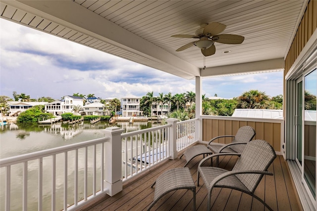 210 Lakeview Dr, Anna Maria, FL 34216 - wooden terrace featuring a residential view, a water view, and a ceiling fan