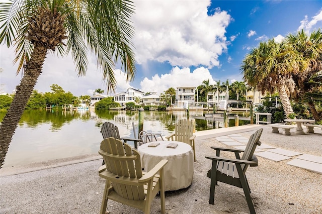 210 Lakeview Dr, Anna Maria, FL 34216 - view of patio / terrace featuring a residential view, a water view, and a boat dock