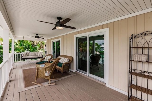 210 Lakeview Dr, Anna Maria, FL 34216 - wooden deck with ceiling fan