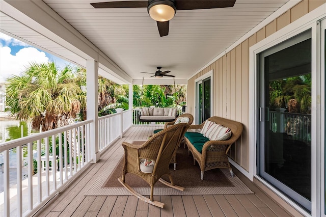 210 Lakeview Dr, Anna Maria, FL 34216 - wooden terrace with a ceiling fan