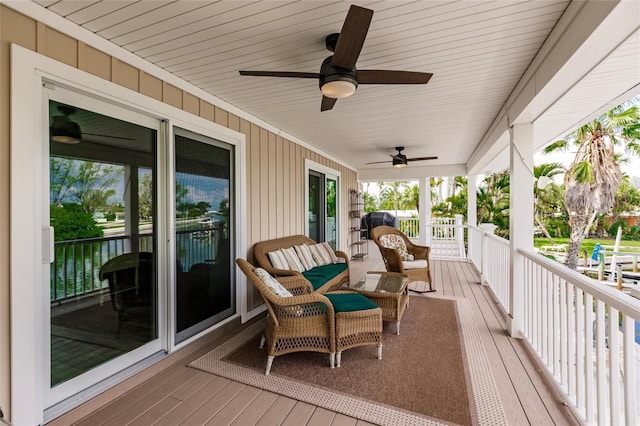 210 Lakeview Dr, Anna Maria, FL 34216 - wooden terrace featuring a ceiling fan