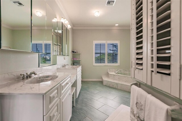 210 Lakeview Dr, Anna Maria, FL 34216 - bathroom with vanity, ornamental molding, a garden tub, and visible vents