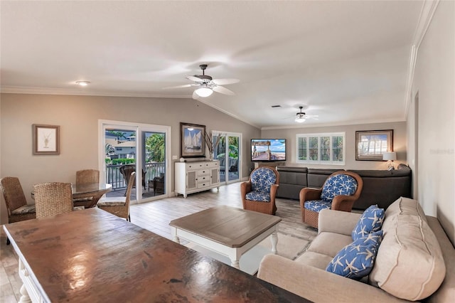 210 Lakeview Dr, Anna Maria, FL 34216 - living area with vaulted ceiling, crown molding, light wood-style floors, and a ceiling fan