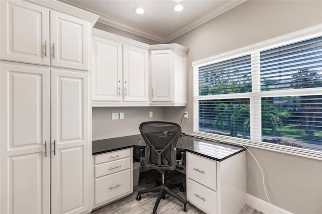 210 Lakeview Dr, Anna Maria, FL 34216 - office featuring crown molding, built in desk, light wood-style floors, and recessed lighting