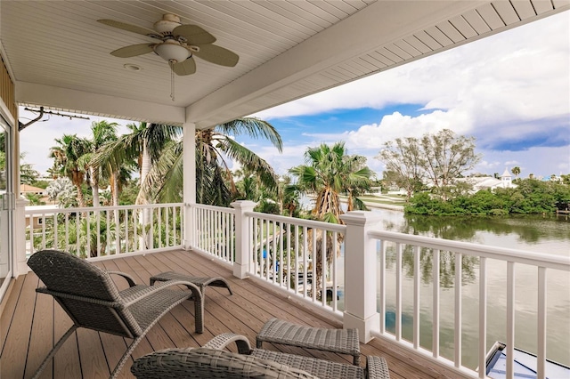 210 Lakeview Dr, Anna Maria, FL 34216 - wooden terrace with a water view and a ceiling fan
