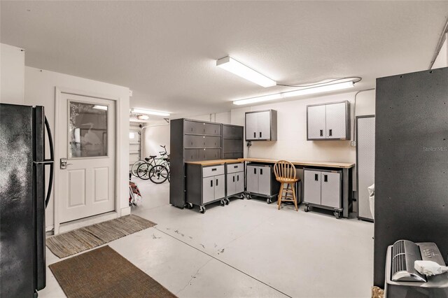 210 Lakeview Dr, Anna Maria, FL 34216 - garage with freestanding refrigerator