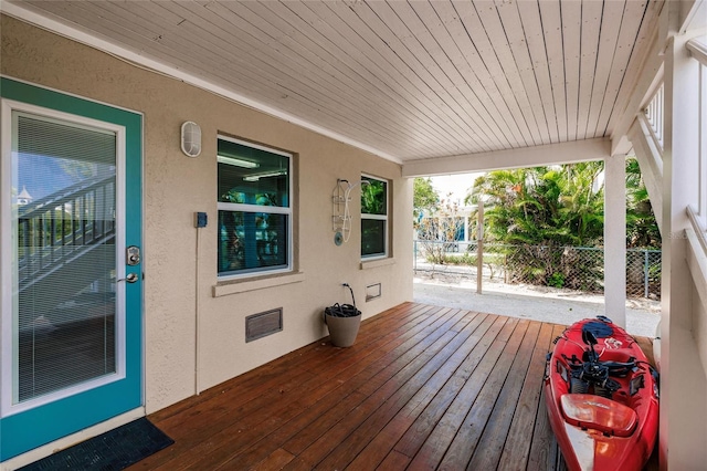 210 Lakeview Dr, Anna Maria, FL 34216 - wooden deck featuring fence