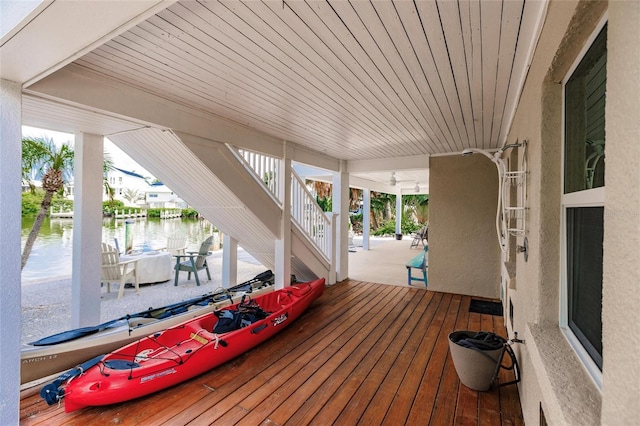 210 Lakeview Dr, Anna Maria, FL 34216 - wooden deck with a water view and stairway