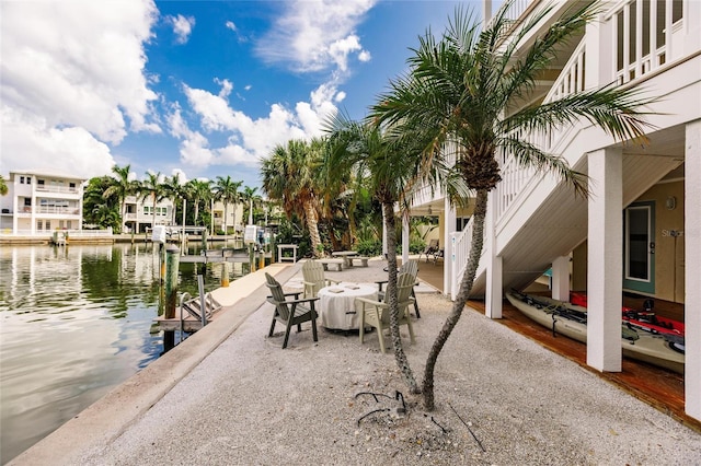 210 Lakeview Dr, Anna Maria, FL 34216 - view of dock with a water view and a patio