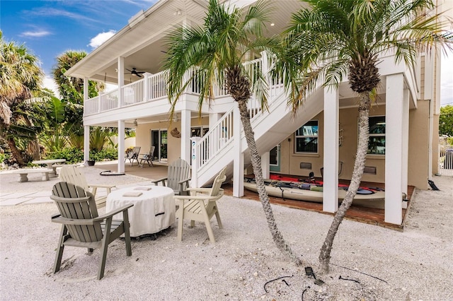 210 Lakeview Dr, Anna Maria, FL 34216 - view of patio featuring stairs and a ceiling fan