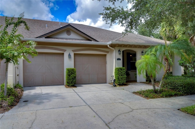 ranch-style home with a garage