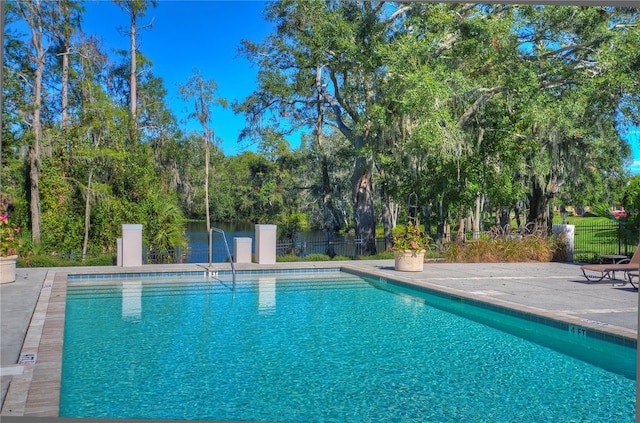 view of pool featuring a patio area