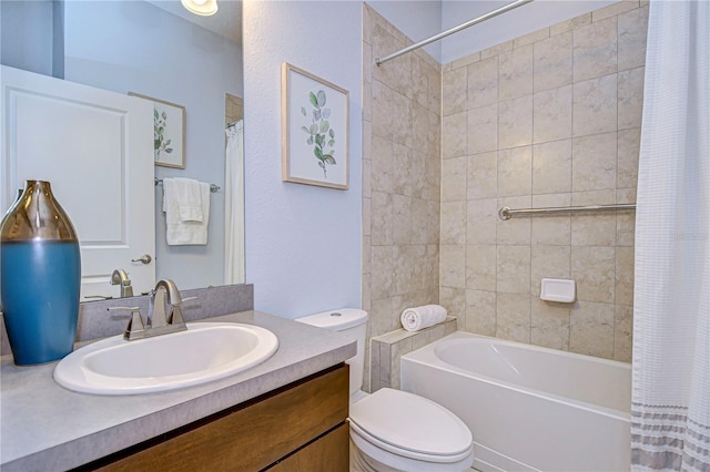 full bathroom with vanity, toilet, and shower / tub combo with curtain