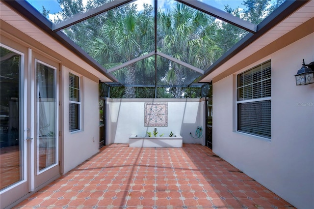 view of patio / terrace with glass enclosure