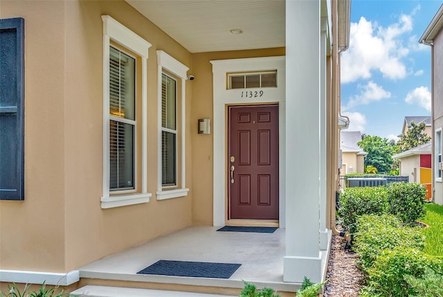 entrance to property with a porch