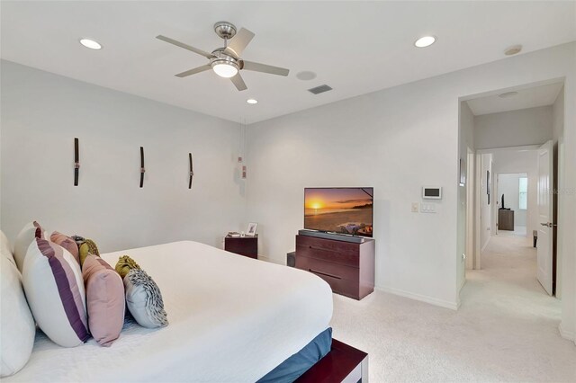 carpeted bedroom with ceiling fan