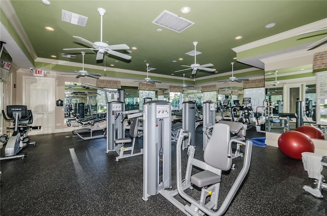 exercise room with ornamental molding