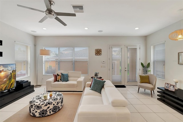 11329 Emerson Lake Dr, Riverview, FL 33578 - living room featuring a ceiling fan, light tile patterned floors, recessed lighting, and french doors