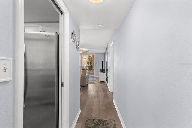 hallway featuring hardwood / wood-style floors