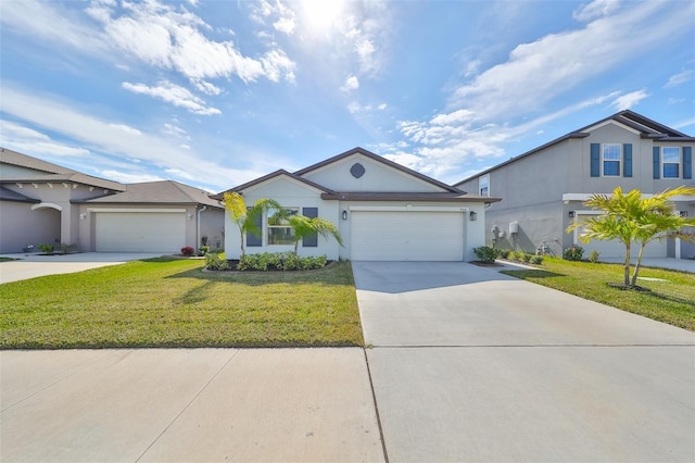 view of front of home with a garage and a front yard