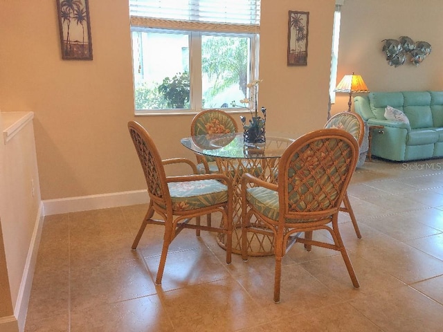 dining room with light tile patterned floors