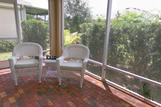 sunroom / solarium with plenty of natural light