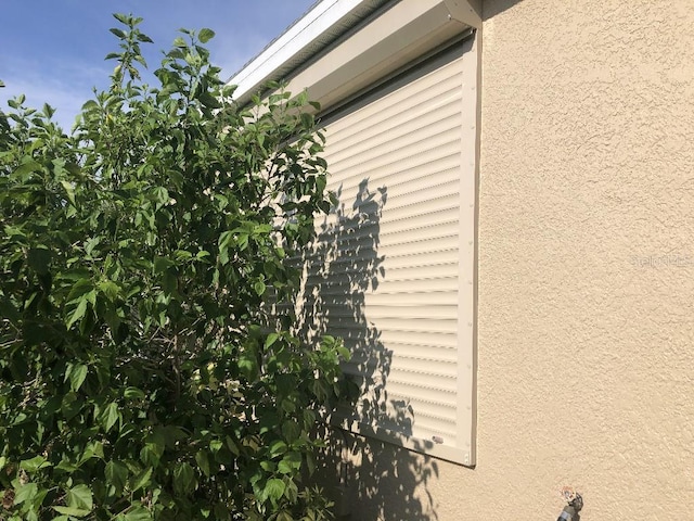 809 Chipper Dr, Sun City Center, FL 33573 - exterior space featuring stucco siding