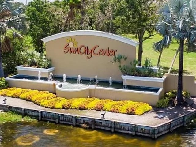 809 Chipper Dr, Sun City Center, FL 33573 - community sign featuring a water view