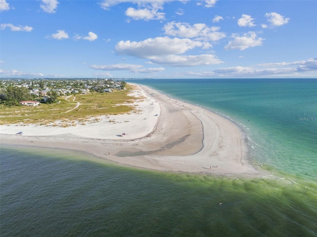 aerial view with a beach view and a water view