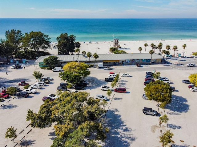 aerial view featuring a beach view and a water view