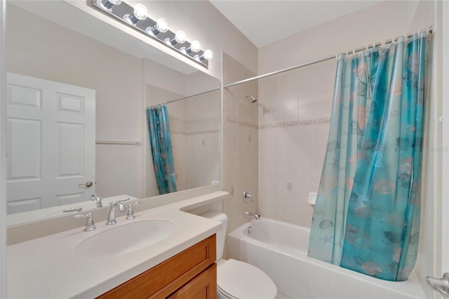 full bathroom featuring shower / tub combo, vanity, and toilet