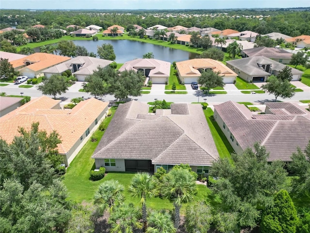 aerial view featuring a residential view and a water view